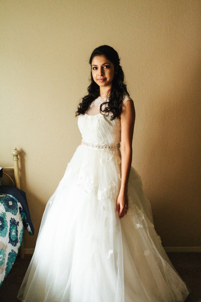brides poses for a full length portrait